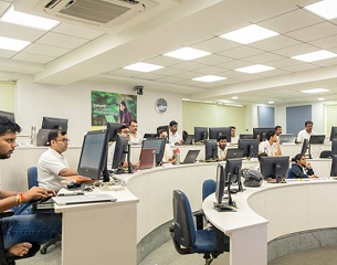 REVA University students working inside a computer networking systems lab floor
